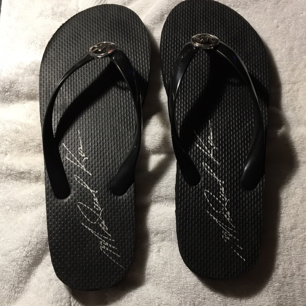 Michael Kors black flip-flops